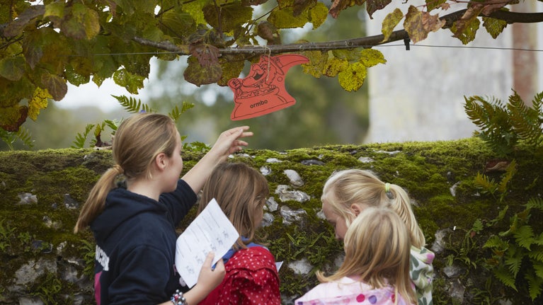 Children on a Halloween trail at Mottisfont, Hampshire, in autumn